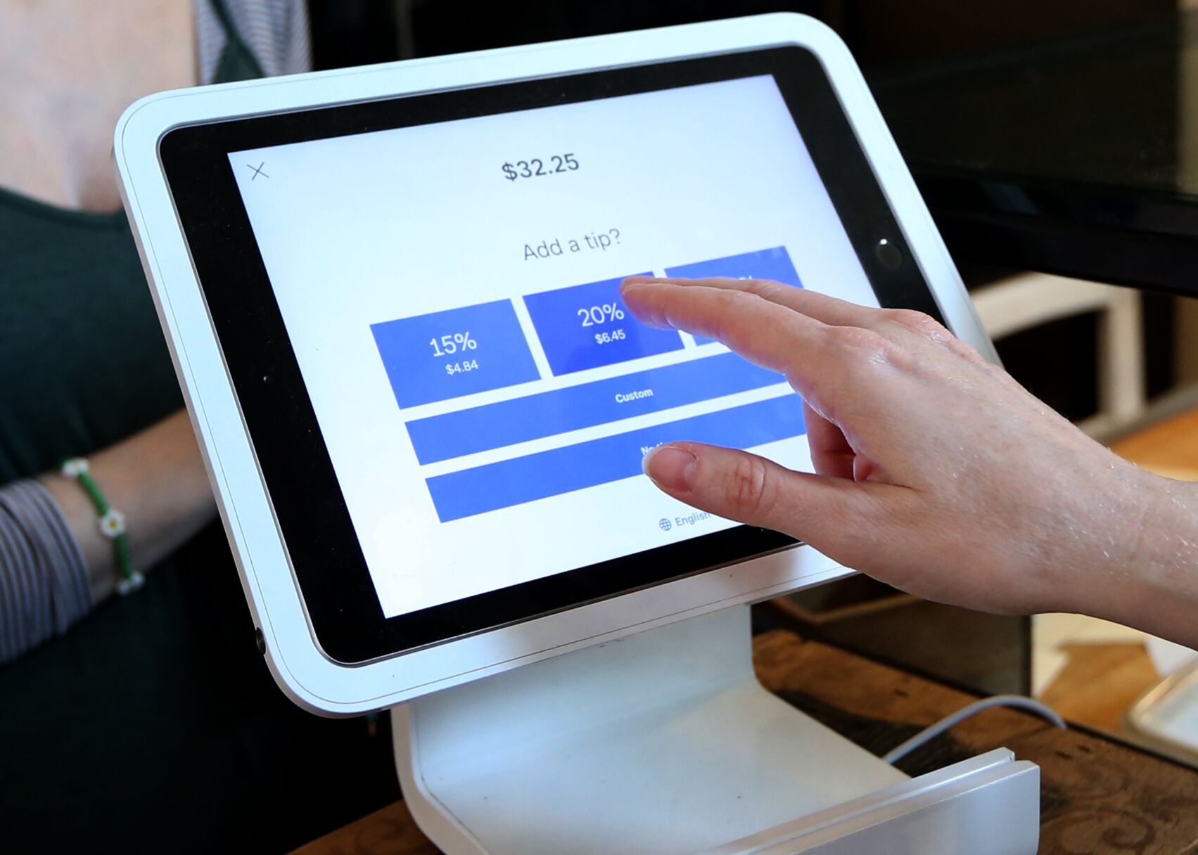 Leaving a tip digitally with Square point of sale